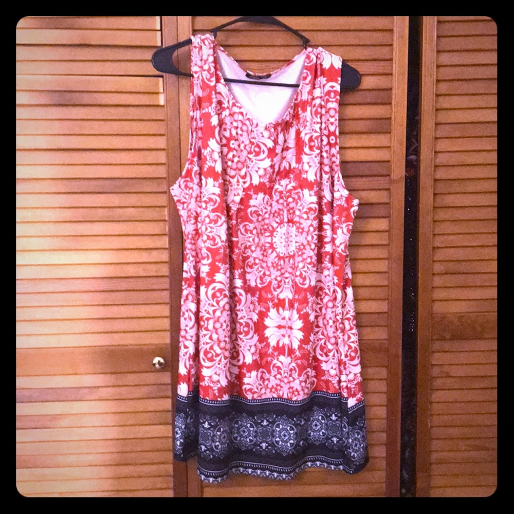 Knee length dress. Never worn, no tags